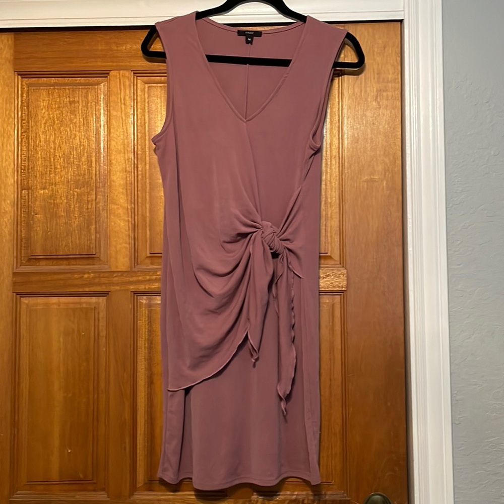 Pink V neck dress with front tie.